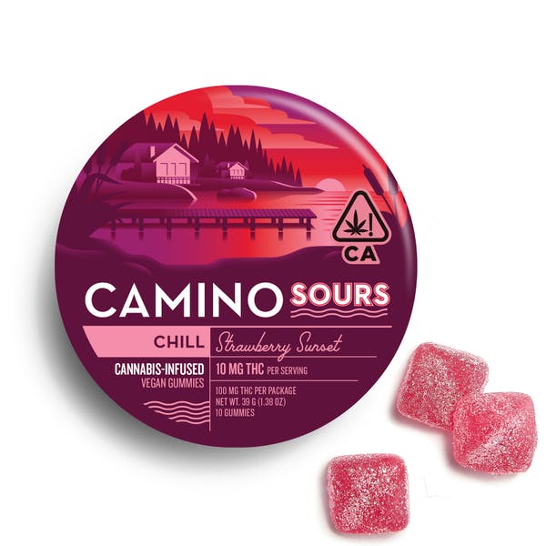 Round tin of Camino Sours cannabis gummies with pink landscape art; three pink gummies shown.