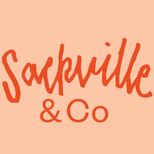 The image shows Sackville & Co written in bold, orange script on a light peach background.