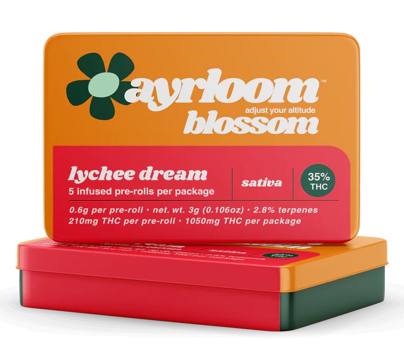 Two orange tins labeled Ayrloom blossom lychee dream containing infused pre-rolls with 35% THC.