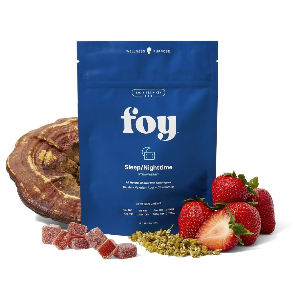 A blue bag of Foy Sleep/Nighttime chews—hailed as some of the Best Cannabis Gummies for Sleep in NYC—features strawberries, chamomile, mushroom, and chew pieces artfully displayed in front.