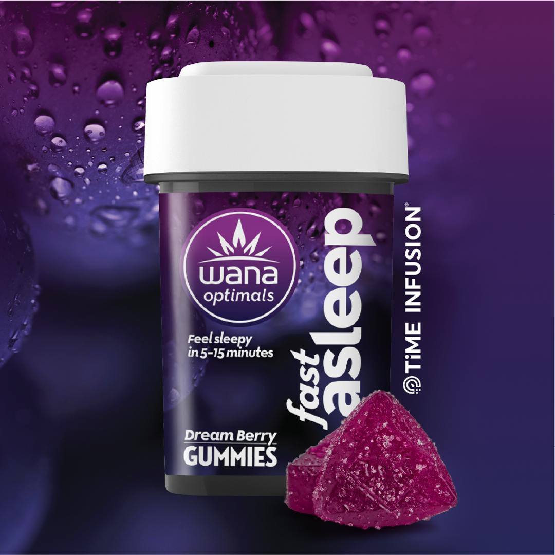 A container of Wana Dream Berry Gummies, known as some of the Best Cannabis Gummies for Sleep in NYC, with a purple gummy piece in front, against a purple background.