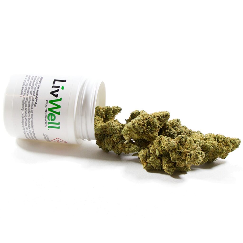 White container labeled LivWell tipped over, spilling cannabis buds—potentially PGR weed—onto a white surface.
