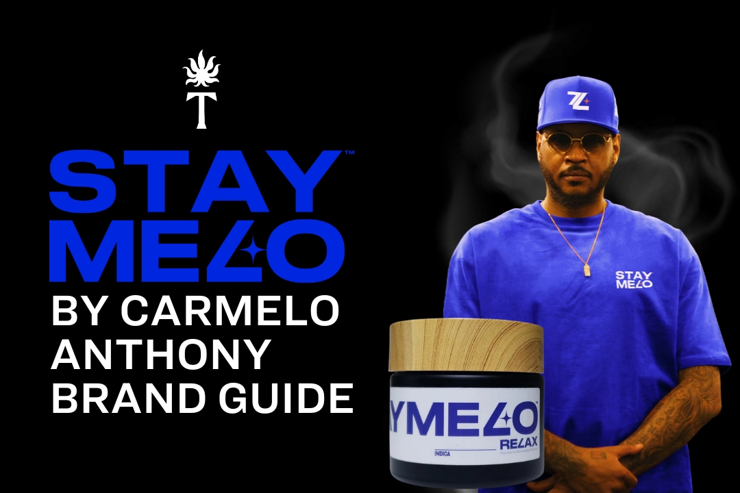 Carmelo Anthony in a blue shirt and hat stands beside STAYME7O branding and a product container.